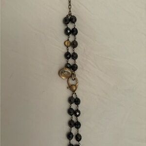 Waxing poetic hematite bracelet.  Adjustable w charm